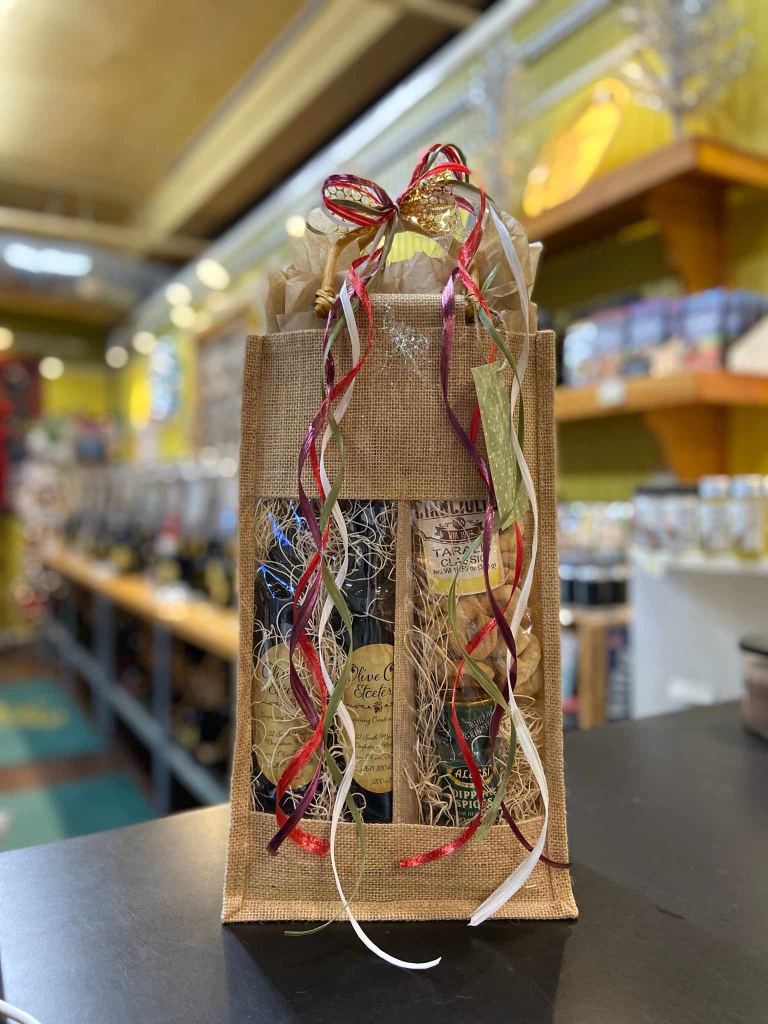 Burlap bag with olive oils & vinegars, crackers and dipping spice