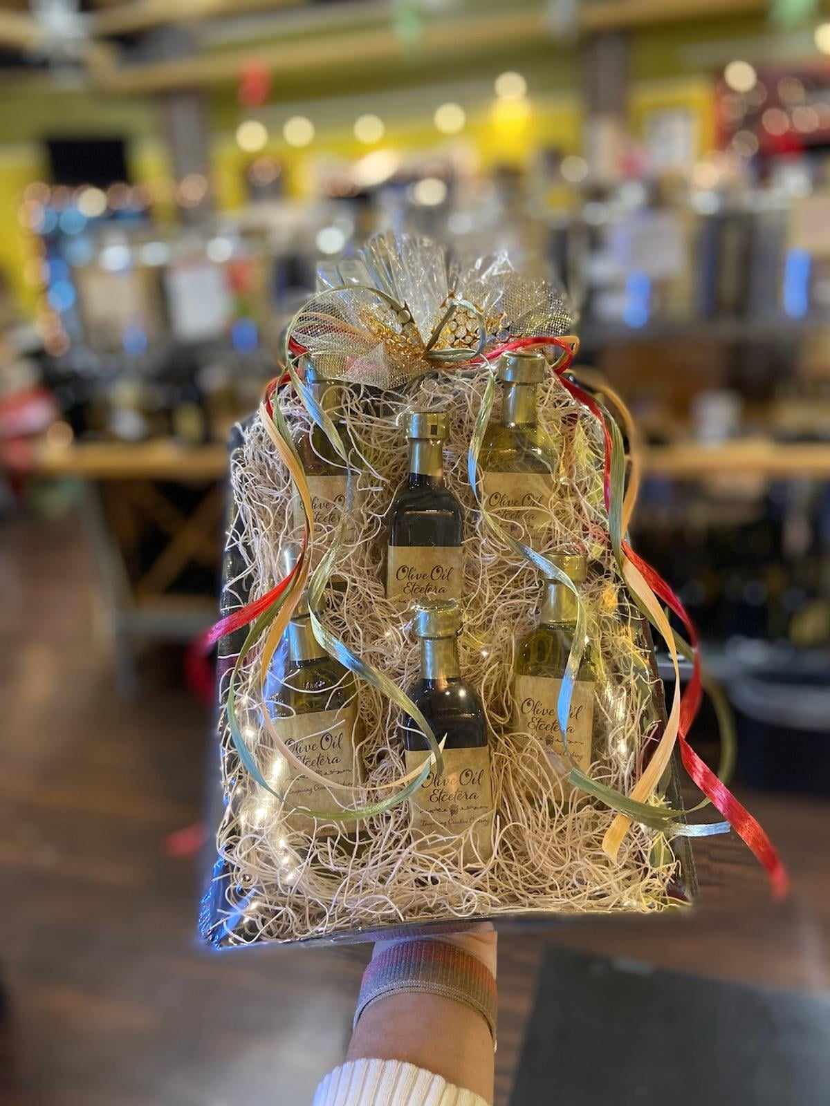 Christmas Holiday Ribbon with an assortment of olive oil and balsamic vinegars 